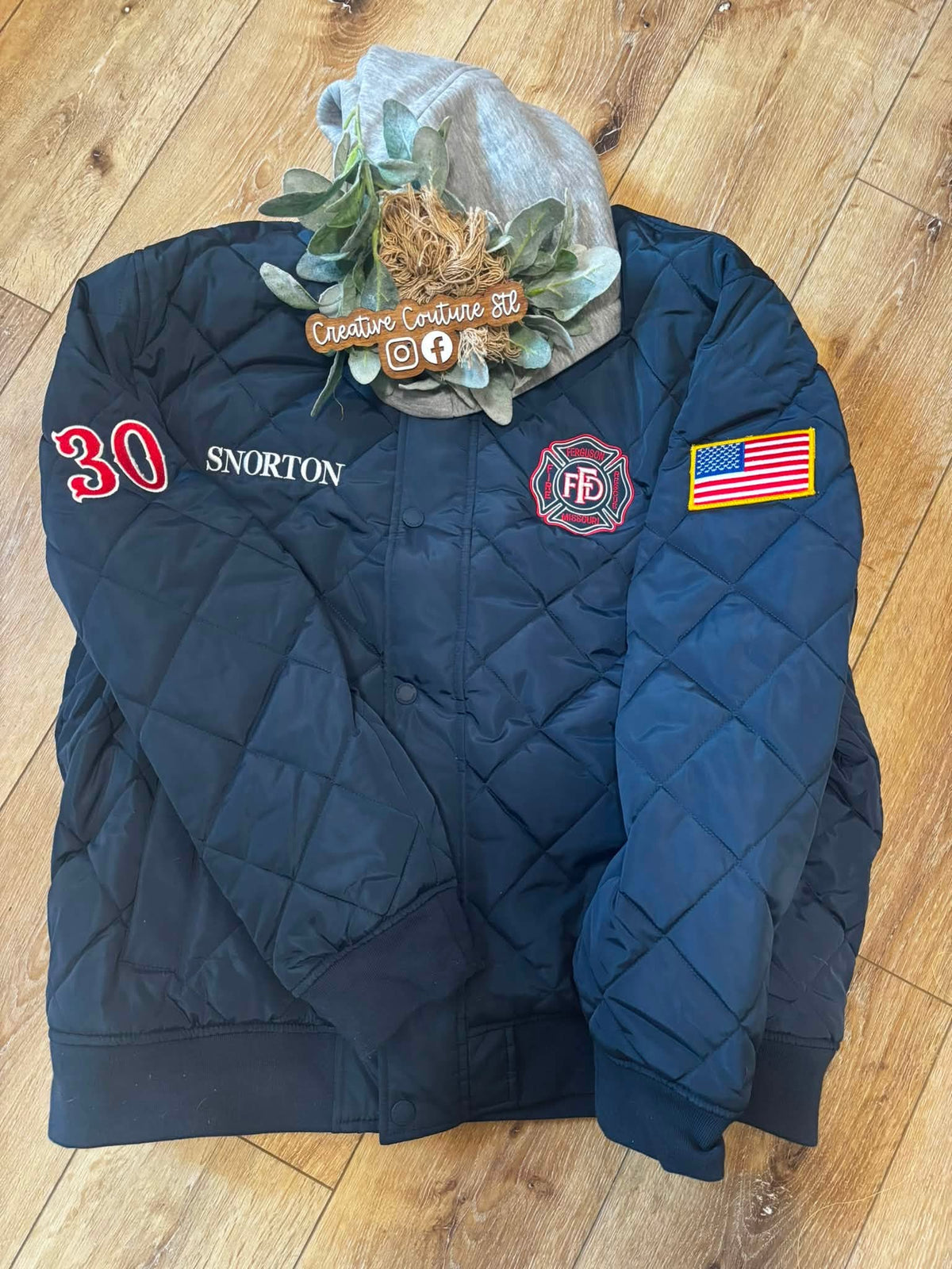 Custom embroidered firefighter diamond quilted jacket front